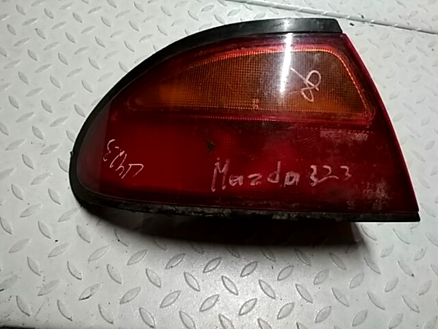 

Фонарь задний левый Mazda 323 BA, 323 BA