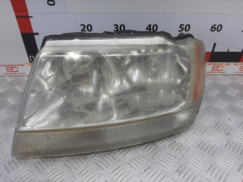 

Фара передняя левая Jeep Grand Cherokee 2, Grand Cherokee 2