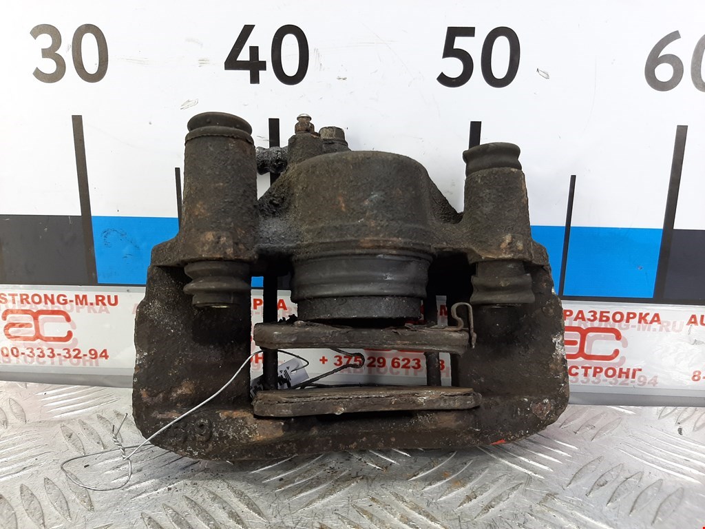 

Суппорт передний правый Mazda 323 BA, 323 BA
