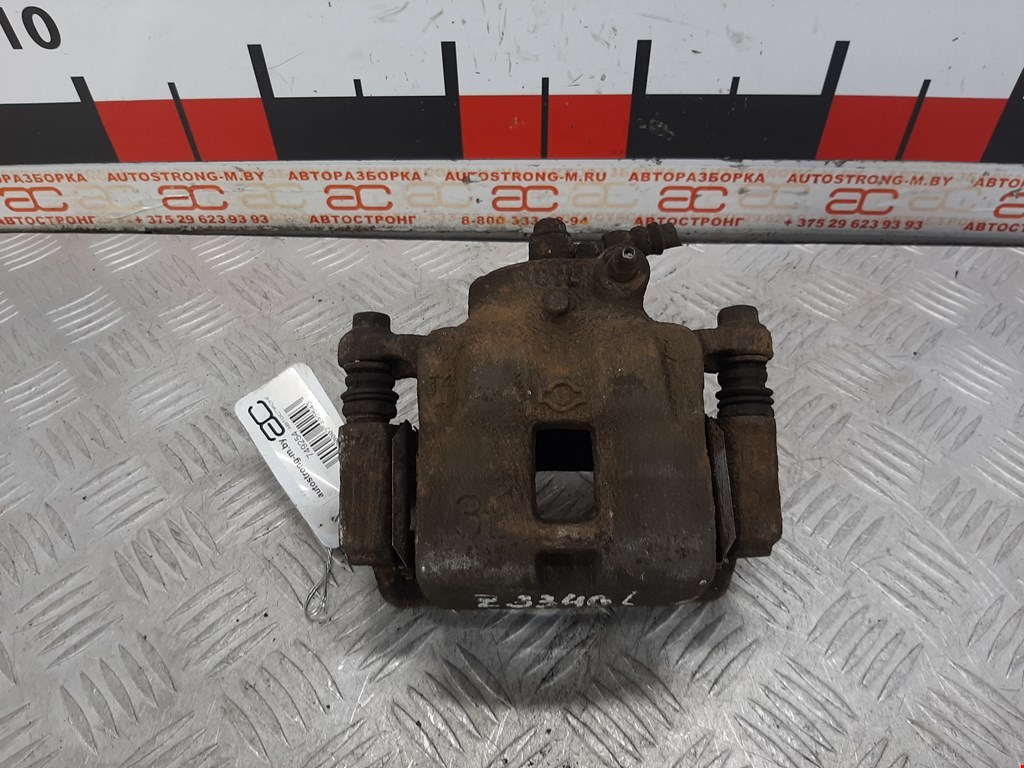 

Суппорт передний левый Nissan Almera N15, Almera N15