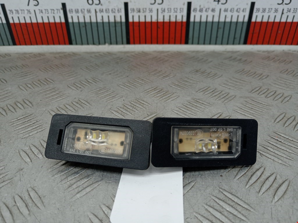 Фонарь подсветки номера BMW 3er F30/F31/F80 2011-2019